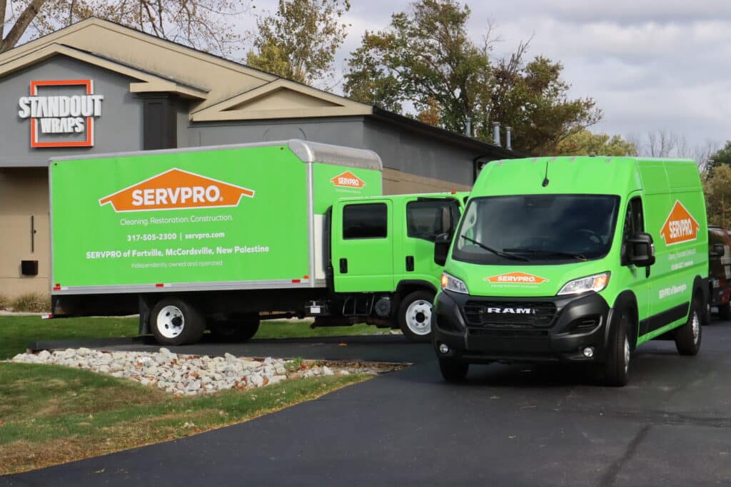 Green ServPro trucks after Standout Wraps service